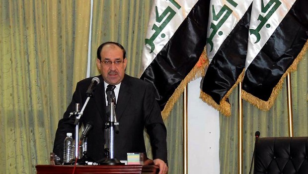 A handout picture released by the Iraqi prime minister's office shows Iraqi Premier Nuri al-Maliki addressing an annual military conference in Baghdad on December 16, 2012. AFP PHOTO / HO / PRIME MINISTER'S OFFICE 