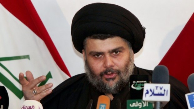 Shiite cleric Muqtada al-Sadr speaks during a press conference in the Shiite holy city of Najaf. (AP Photo/ Alaa al-Marjani)