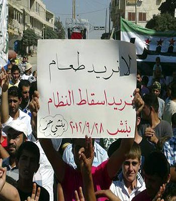 Demonstrators protest against Syria's President Bashar al-Assad after Friday prayers in Binsh near Idlib. (R)