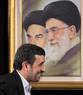 Iran's President Mahmoud Ahmadinejad exits his news conference. (AFP)