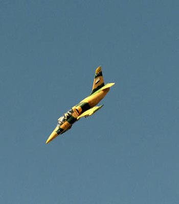 A Syrian army fighter jet flies over the northern city of Aleppo. (AFP)