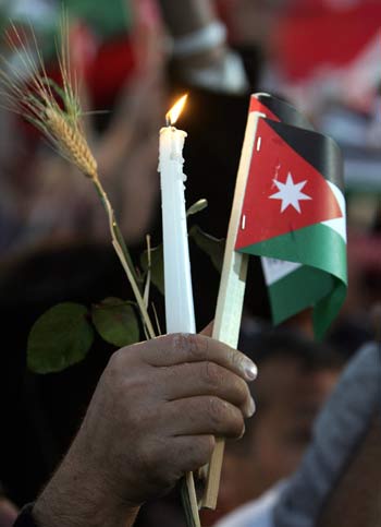 a silent demonstration to commemorate the victims of the terrorist attacks (AFP)