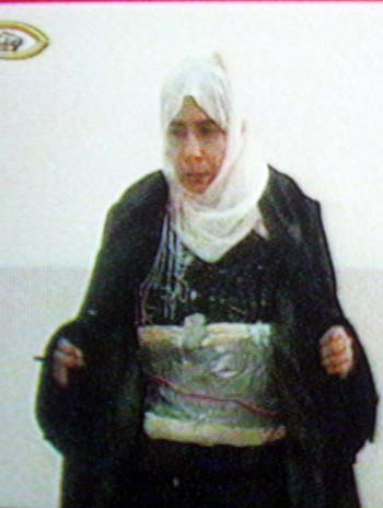 A video grabbed image from Jordanian television showing an Iraqi woman who allegedly confessed to trying to detonate explosives in one of three Amman hotels bombed by al-Qaeda in Iraq. (EPA)
