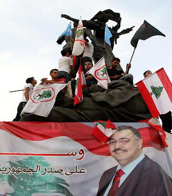 Supporters of the March 14th anti-Syrian opposition coalition take part in a protest a day after the assassination of intelligence chief General Wissam al-Hassan in Martyrs' Square in Beirut. (AFP)