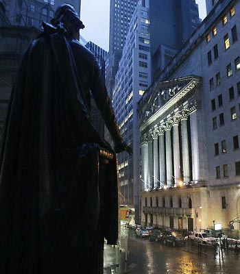 The statue of George Washington at Federal Hall is displayed near the front of the New York Stock Exchange, Monday, Oct. 29, 2012.(AP)