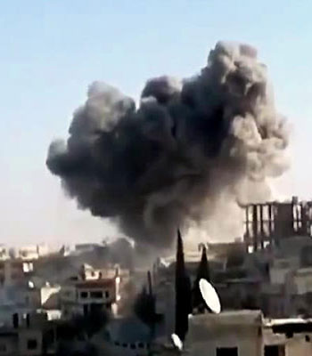 An image grab taken from a video uploaded on YouTube shows smoke billowing following an alleged air force bombing by Syrian government forces in the northwestern province of Idlib. (AFP)