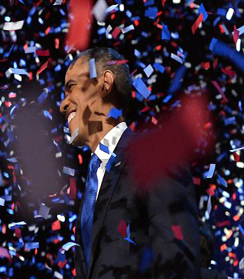 President Barack Obama celebrates after delivering his acceptance speech in Chicago. (AFP)