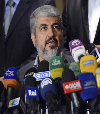 Hamas's leader in exile Meshaal speaks during a news conference in Cairo. (R)