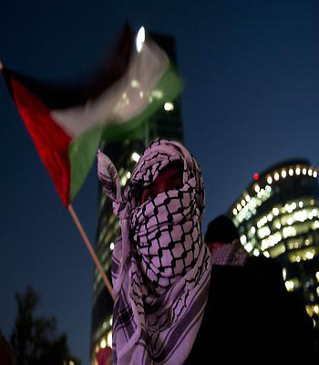 Members of the Palestinian community and Mexicans participate in a protest against Israeli strikes in Gaza at the Independence Angel square in Mexico City on November 20, 2012. (AFP)