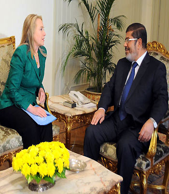 U.S. Secretary of State Hillary Rodham Clinton, left, meets with Egyptian President Mohammed Mursi, in Cairo, Egypt. (AP)