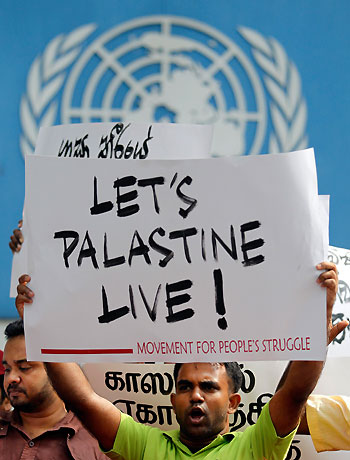 A member of the Movement For People's Struggle shouts slogans during a protest against Israel's military action in Gaza, in front of the UN (United Nations) office in Colombo November 23, 2012. (Reuters)