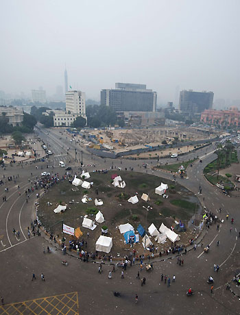 People are seen milling around at Egyptian revolution landmark Tahrir Square in Cairo on November 24, 2012, the day after opposition-led protests were held in most of Egypt's major cities. (AFP)