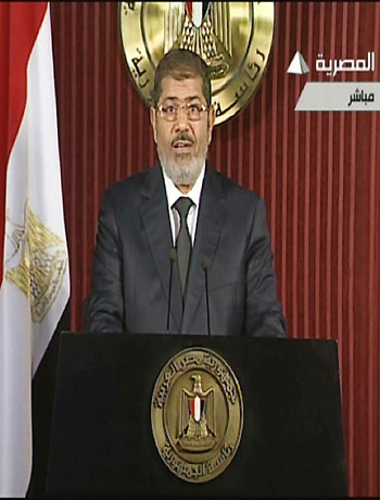 An image grab taken from Egyptian state TV shows Egyptian President Mohamed Morsi as he gives an address in Cairo on December 6, 2012. (AFP)