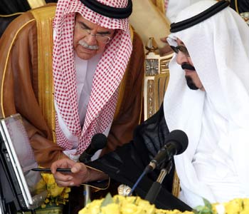 Saudi King Abdullah bin Abdulaziz speaks to his Oil MinisterAli al-Nuaimi (L) during the opening of the permanent seat of the International Energy Forum in Riyadh (AFP)