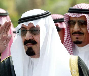 King Abdullah bin Abdulaziz salutes as he attends the opening of the permanent seat of the International Energy Forum in Riyadh (AFP)