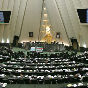 Iranian President Mahmoud Ahmadinejad speaks during a parliament session to vote on his nominee for the post of oil minister, 23 November 2005 in Tehran (AFP)