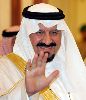Saudi Crown Prince Sultan Bin Abdul Aziz waves to photographers prior to the closing session of the Islamic Summit in Mecca, 8 December 2005 (EPA)