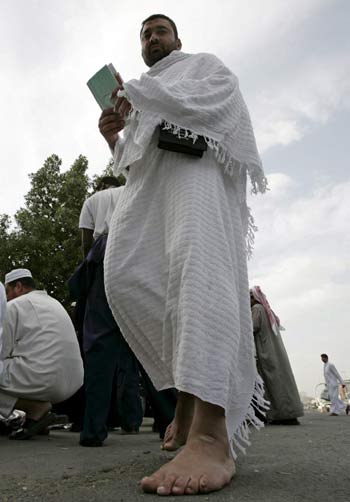 A Muslim pilgrim walks to pray at the al-Haram Sharif in the holy city of Mecca (EPA)