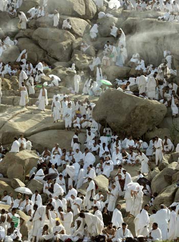 Muslim pilgrims gather at Jabal Al Rahma Holy Mountain, the mountain of forgiveness, in Arafat outside Mecca, Saudi Arabia (AP)