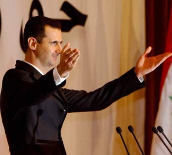 Syrian President Bashar Assad addresses the opening session of the 22nd General Conference of the Arab Lawyers Federation in Damascus (EPA)