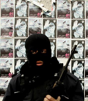 Palestinian policeman takes over parliament buildings in Gaza city (R)