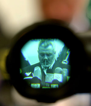 Hamas leader Ismail Haniyeh is seen through the viewfinder of a cemera as he speaks during a news conference in Gaza City, Jan. 30, 2006 (AP)