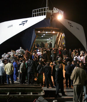 An Egyptian ferry carrying survivors of a ferry accident arrives at the Red Sea port of Hurghada February 4, 2006 (REUTERS)