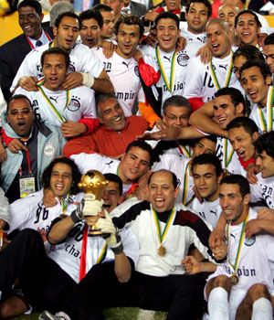 Egyptian National team celebrates after Egypt won the Africa Cup of Nations final match against Ivory Coast, at the Cairo Stadium in Cairo, Egypt, 10 February 2006 (EPA)
