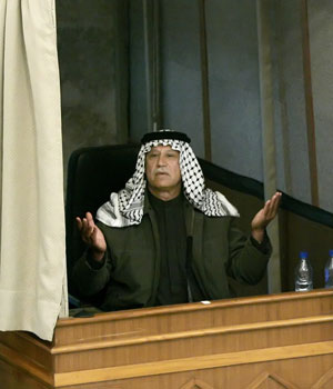 Fadil Safij Muhammad, a former Iraqi intelligence officer, testifies at the court of the Iraqi High Tribunal inside the heavily fortified Green Zone, 14 February 2006 (AFP)