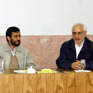 Iran's President Mahmoud Ahmadinejad and President of the Atomic Energy Organization of Iran, Reza Aghazadeh seen during their visit at the Natanz uranium enrichment facilities, Feb 15 2006 (AP)