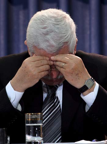 Palestinian President Mahmoud Abbas during the swearing-in ceremony in his Ramallah, West Bank headquarters of the Hamas-dominated Palestinian Legislative Council (EPA)