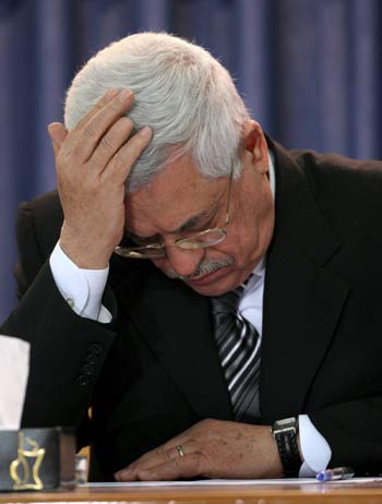 Palestinian President Mahmoud Abbas during the swearing-in ceremony in his Ramallah, West Bank headquarters of the Hamas-dominated Palestinian Legislative Council (EPA)