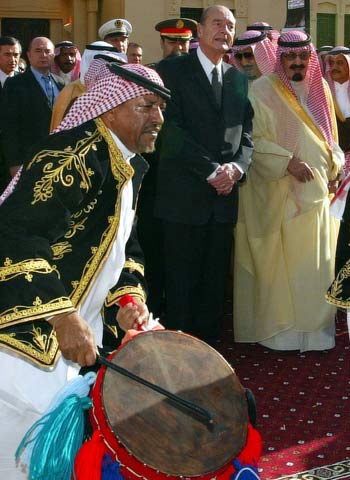 French President Jacques Chirac, second right, and Saudi Arabia's King Abdullah bin Abdulaziz Al Saud watch traditional dancers in Riyadh (AP)