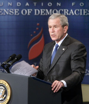 U.S. President George W. Bush speaks about the U.S. military involvement in Iraq while at the Dorothy Betts Marvin Theatre at the George Washington University in Washington March 13, 2006 (REUTERS)