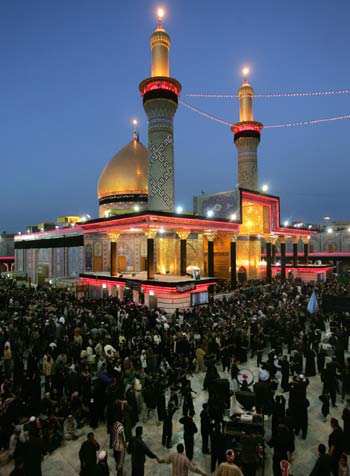 Shiite pilgrims gather near Imam al-Abbas shrine for religious ceremony in Kerbala (R)