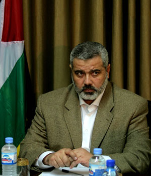 Palestinian Prime Minister Ismail Haniyeh of the Islamic group Hamas looks on while attending the first cabinet meeting in Gaza City, March 31, 2006 (AP)