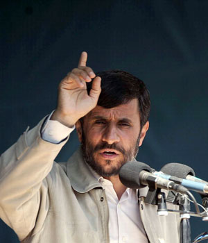 Iran's president Mahmoud Ahmadinejad, speaks in Roshtkhar during his trip to Khorasan Razavi province 890 km (530 miles) north east of Tehran in Iran, April 12, 2006 (AP)