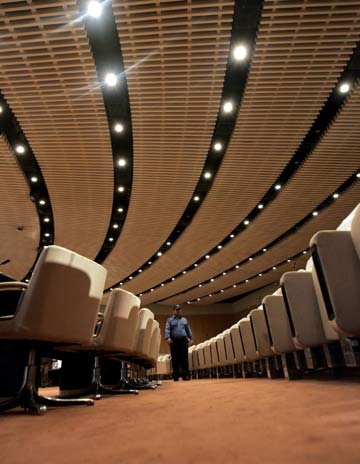 An Iraqi police officer walks between the aisles ahead of a parliament(representatives council) session (AFP)