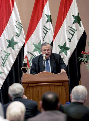 Iraqi President Jalal Talabani delivers a speech during the first session of the Iraqi parliament (R)