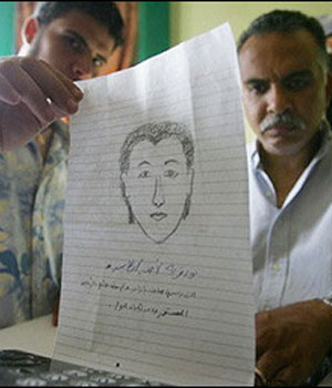 An Egyptian man holds a drawing of one of the suspects of the blasts in the Red Sea resort of Dahab, drawn by a shop owner at the scene of the bombings (AFP)