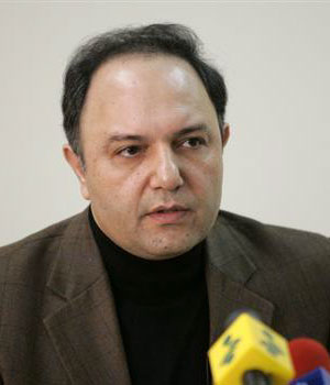 Deputy head of Iran's Atomic Energy Organization Mohammad Saeedi speaks to the media in Tehran January 10, 2006 (AFP)