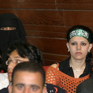 Female students listen to a speech by Hamas' exiled supreme political leader, Khaled Meshaal, at Damascus University 03 May 2006 (AFP)