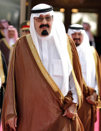 King Abdullah bin Abdulaziz arrives for the opening of Gulf Cooperation Council consultative summit in Riyadh (AFP)
