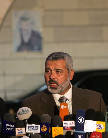 Palestinian Prime Minister Ismail Haniya addresses a press conference after his meeting with Palestinian President Mahmud Abbas (AFP)