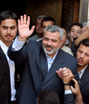 Palestinian Prime Minister Ismail Haniyeh of the Islamic group Hamas leaves a mosque after Friday noon prayers in Gaza City, May 19, 2006 (AP)
