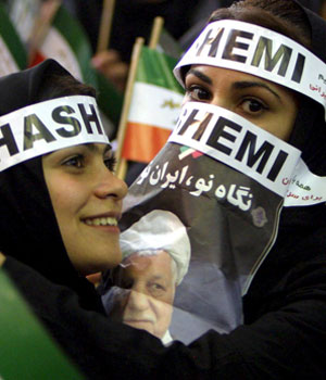Young Iranian supporters of presidential candidate Akbar Hashemi-Rafsanjani attend a campaign rally meeting in Tehran,15 June 2005 (EPA)
