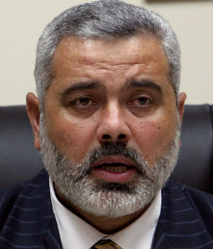 Palestinian Authority Prime Minister Ismail Haniyeh of the Islamic group Hamas, heads a cabinet meeting at his office in Gaza City, May 30, 2006 (AP)