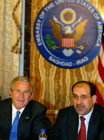 President Bush in a meeting with newly named Iraqi Prime Minister Nouri al-Maliki (AP)