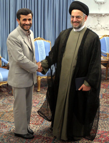 Mahmoud Ahmadinejad, Abdul Aziz al-Hakim Iranian President Mahmoud Ahmadinejad, left, shakes hands with Abdul Aziz al-Hakim (AP)