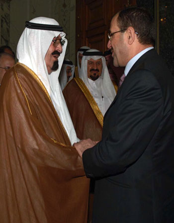 Iraqi Prime Minister Nuri al-Maliki is greeted by Saudi King Abdullah bin Abdulaziz (AFP)